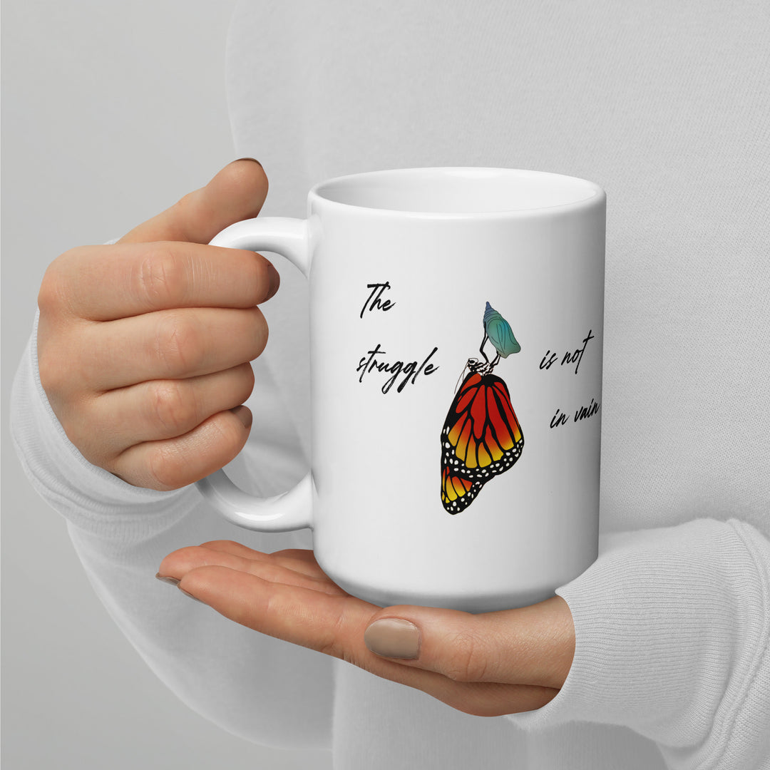 White glossy mug (The struggle is not in vain design)