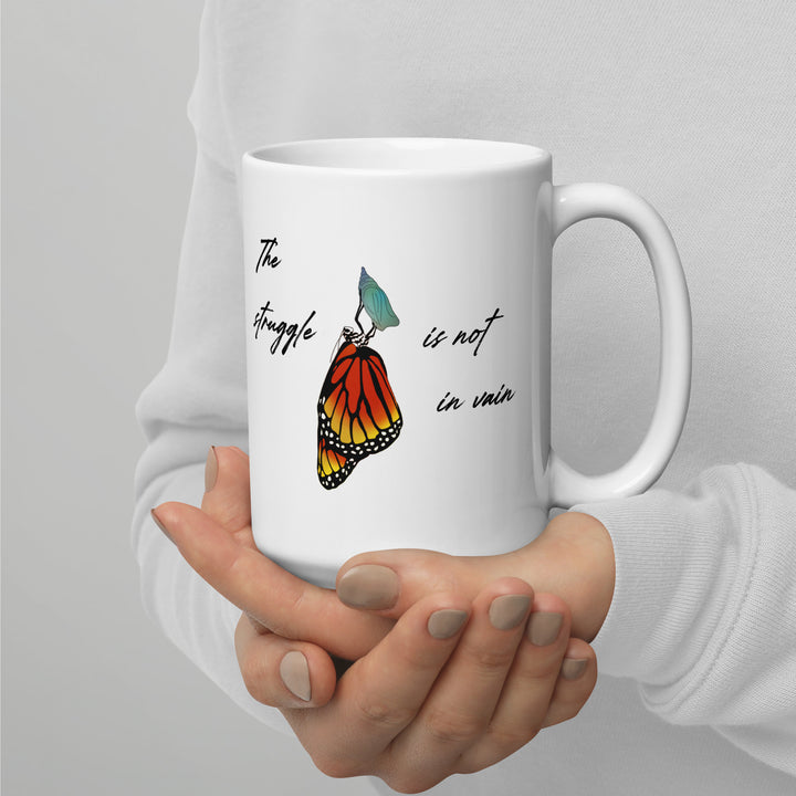 White glossy mug (The struggle is not in vain design)