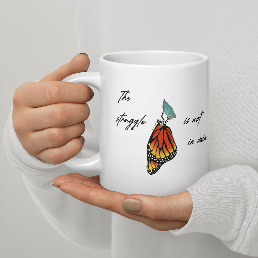 White glossy mug (The struggle is not in vain design)