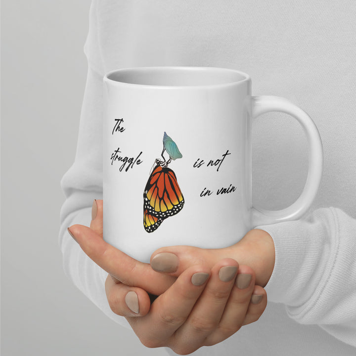 White glossy mug (The struggle is not in vain design)